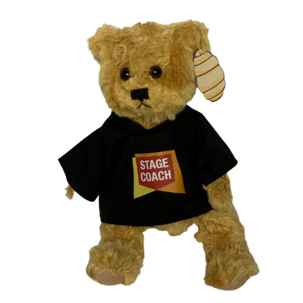 Stagecoach Teddybär mit Minishirt in schwarz mit Logo von Stagecoach in gelb, orange, rot